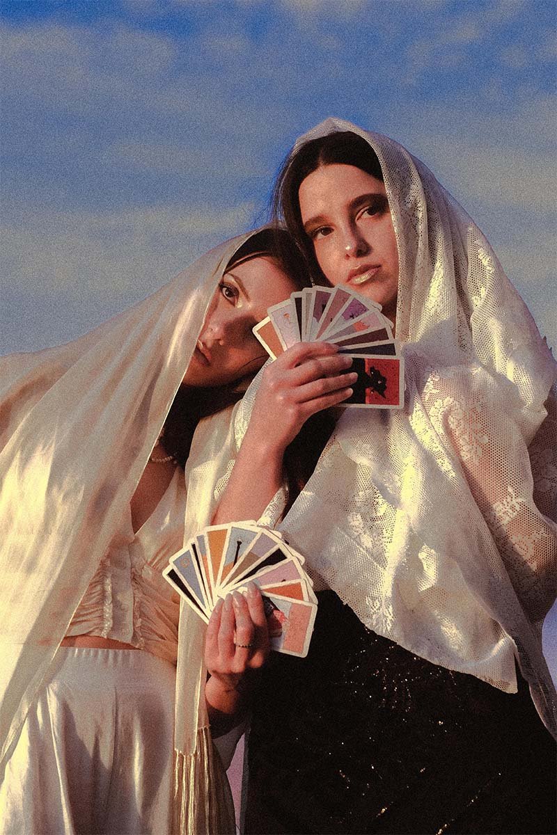 Witches with tarot decks